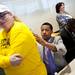 Michigan sophomore Trey Burke signs a fan's shirt before the basketball banquet on Tuesday, April 16. AnnArbor.com I Daniel Brenner